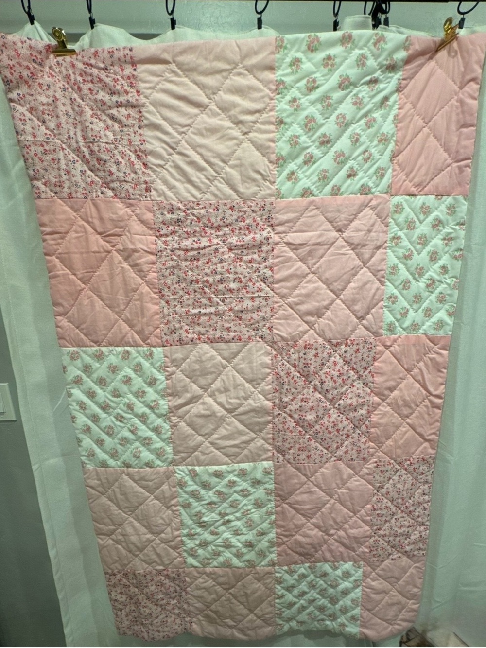 Handmade Pink Patchwork Quilt for your babies crib or toddler bed.